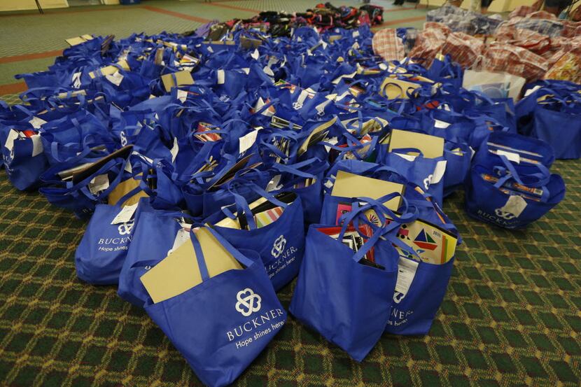  School supplies were prepared for distribution to foster children by volunteers at Buckner...
