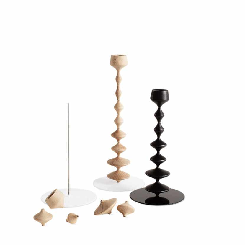 Change up modular pieces in the playful Les Perles candlesticks designed by FX Balléry...