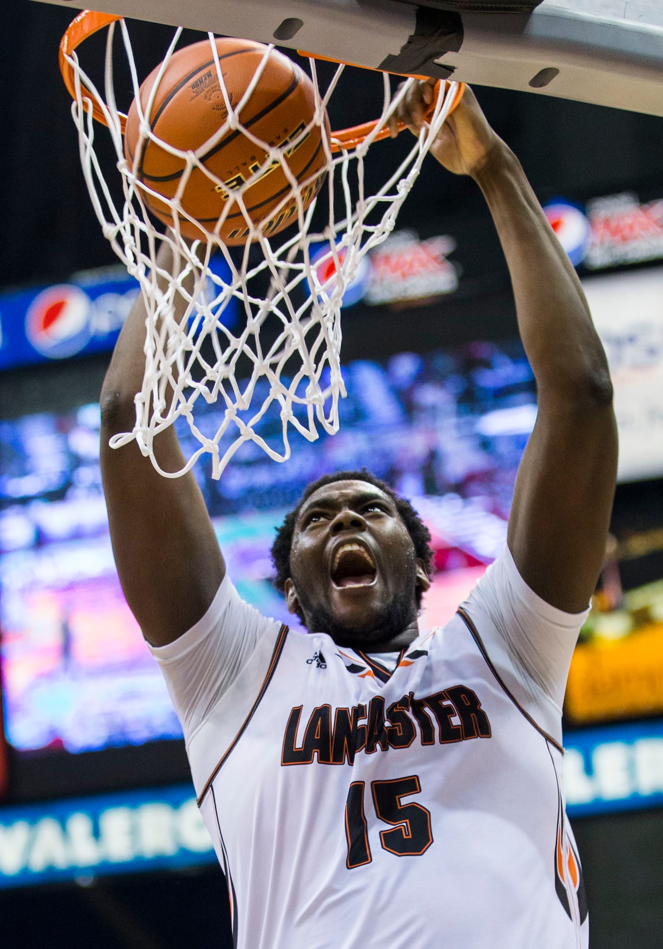 Lancaster forward/center Elijah Thomas (15) dunks during their UIL Class 5A state...