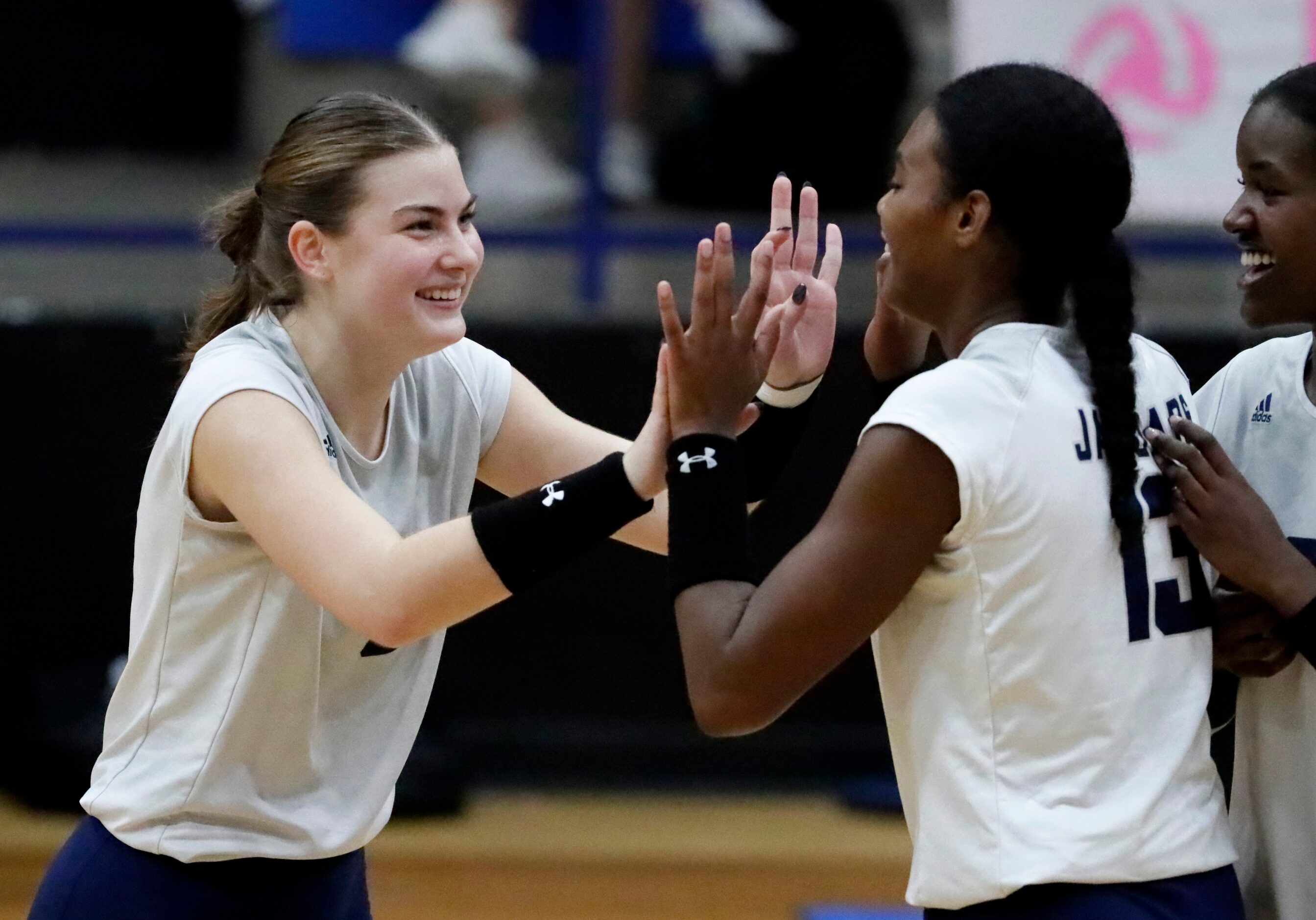 Flower Mound High School middle hitter Liz Goodspeed (6) and Flower Mound High School...