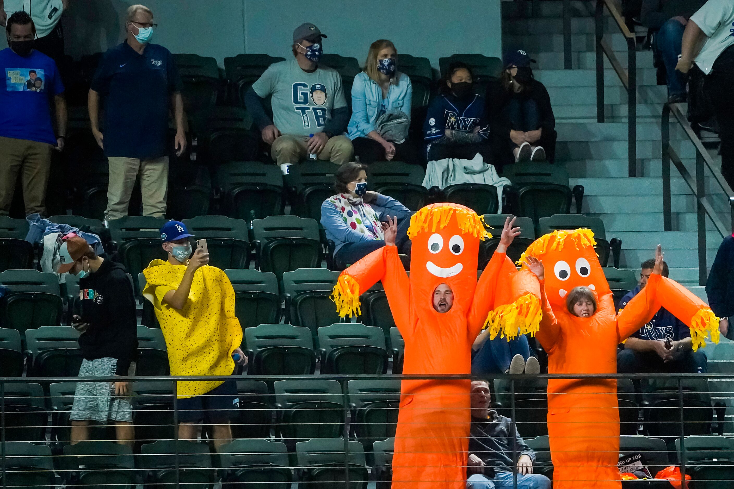 Gans celebrate the final out of the Los Angeles Dodgers 6-2 victory over the Tampa Bay Rays...