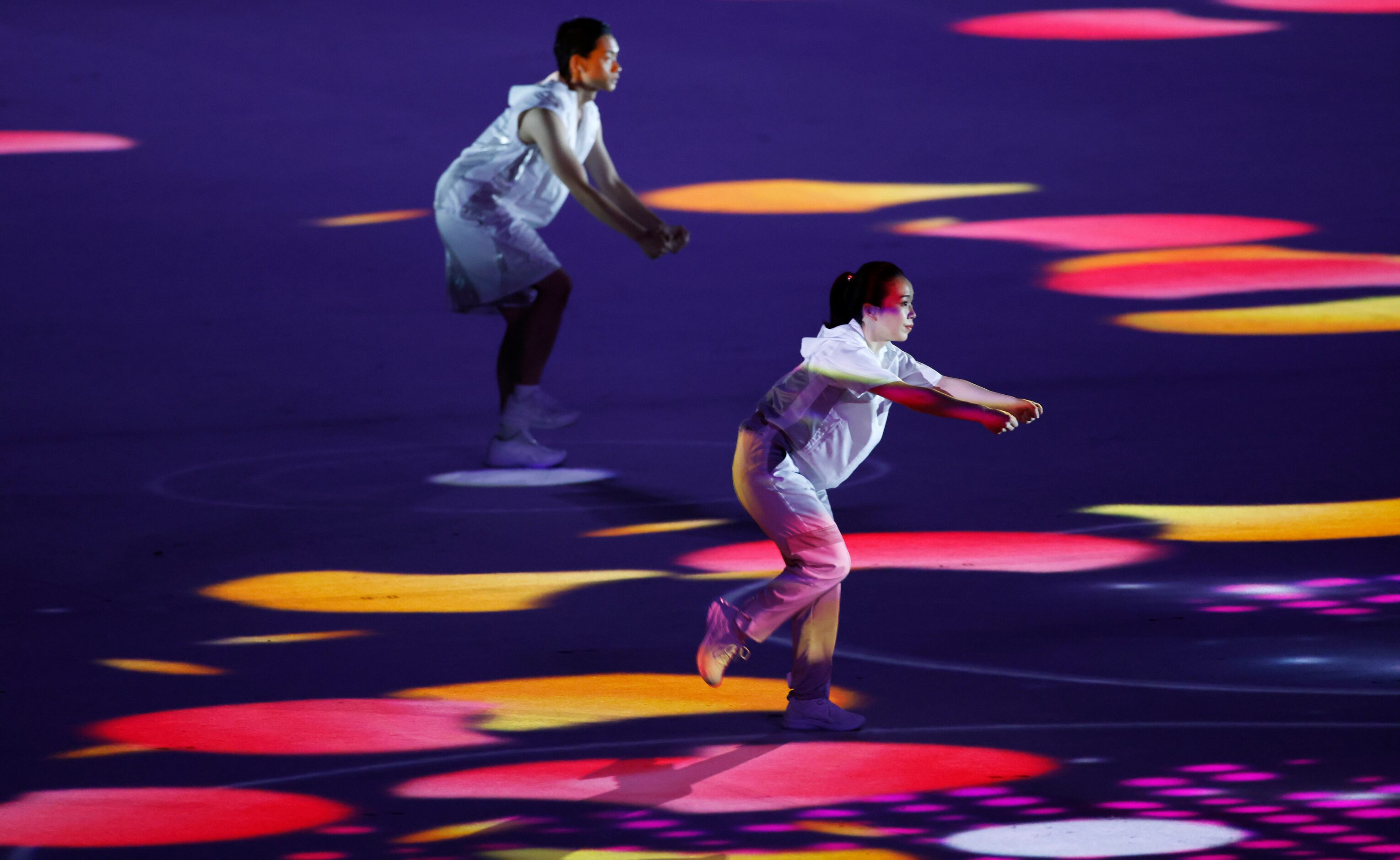 Entertainers performs during the opening ceremony for the postponed 2020 Tokyo Olympics at...