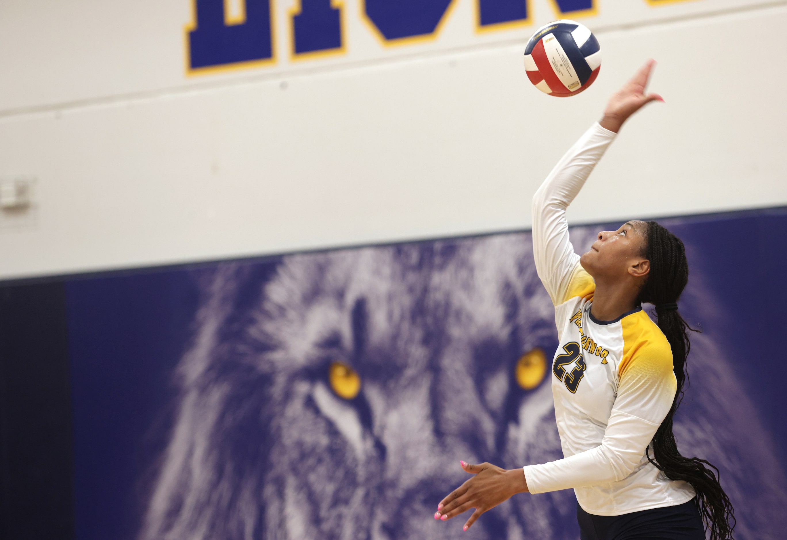 Prestonwood player #23 Macaria Spears serves the ball during the Ursuline Academy of Dallas...