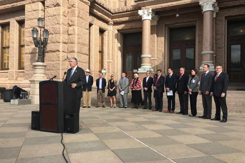 State Rep. Paul Workman, R-Austin, speaks at a news conference Tuesday morning where he...