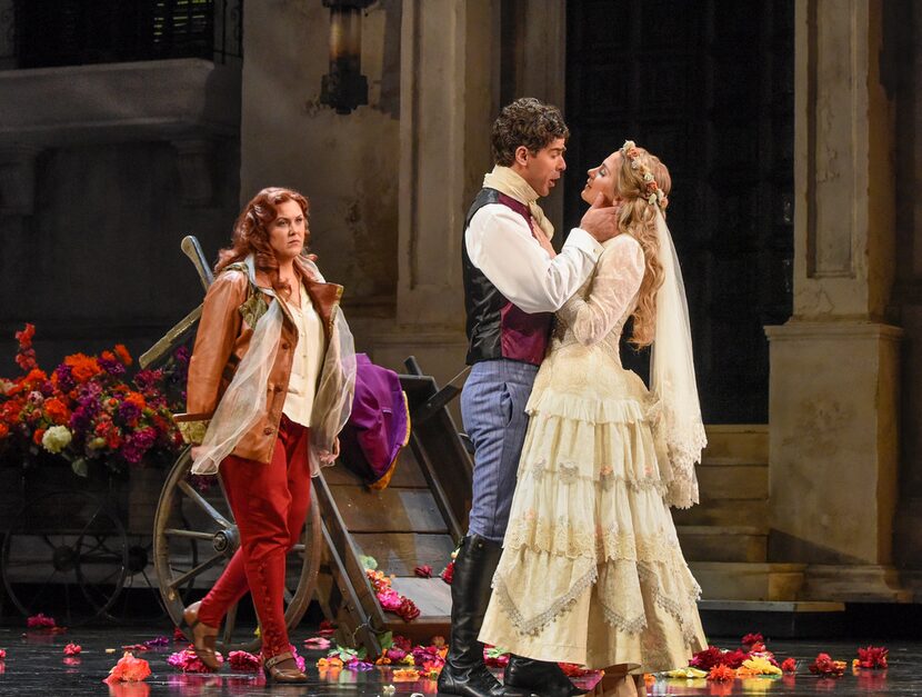 Katie van Kooten (left) as Donna Elvira, Craig Verm as Don Giovanni and Virginie Verrez as...