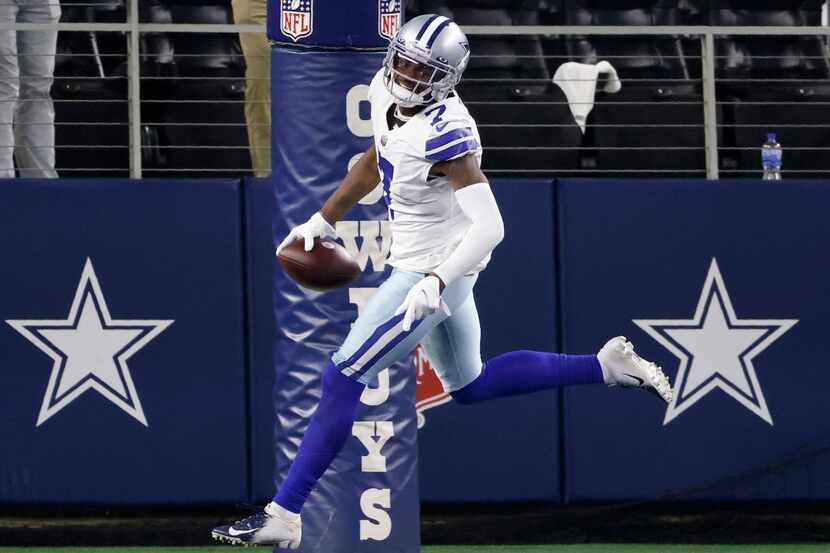 Dallas Cowboys cornerback Trevon Diggs (7) and safety Jayron Kearse (27) celebrate after...