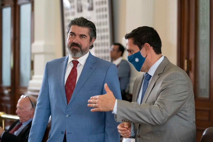 State Rep. Eddie Rodriguez, l, D-Austin, talks with Rep. Trey Martinez-Fischer, D-San...