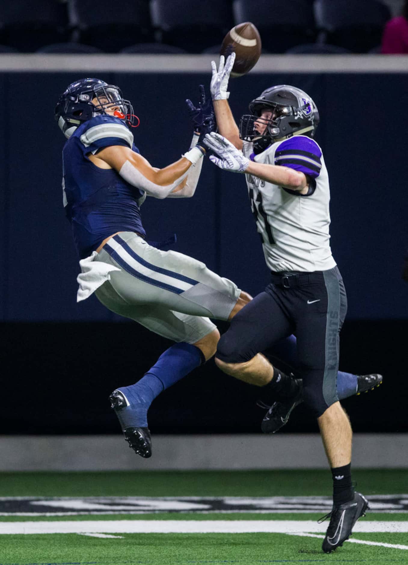 Frisco Lone Star wide receiver Trace Bruckler (4) makes a catch with Frisco Independence...