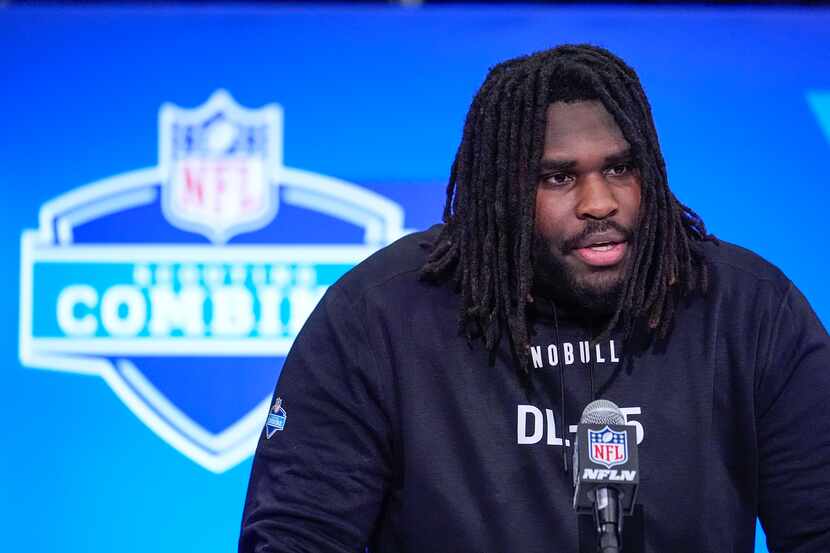 Texas defensive lineman T'Vondre Sweat speaks during a press conference at the NFL football...