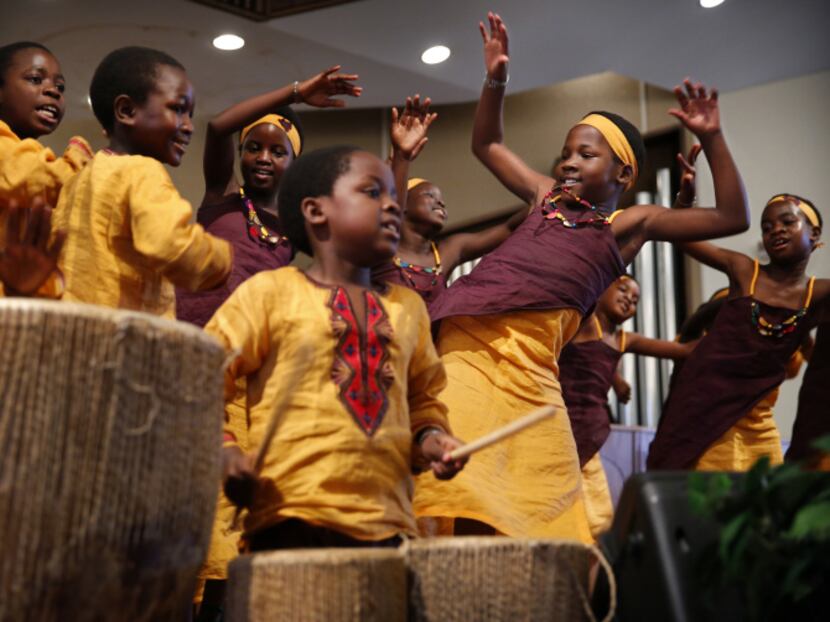 Peninah Aliano (second from right), 10,  and other members of the African Children's Choir...