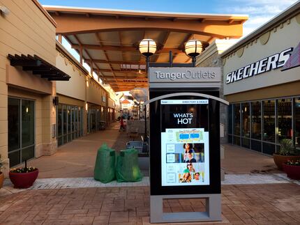 The Tanger Outlets shopping center is getting ready to open in October near the Texas Motor...