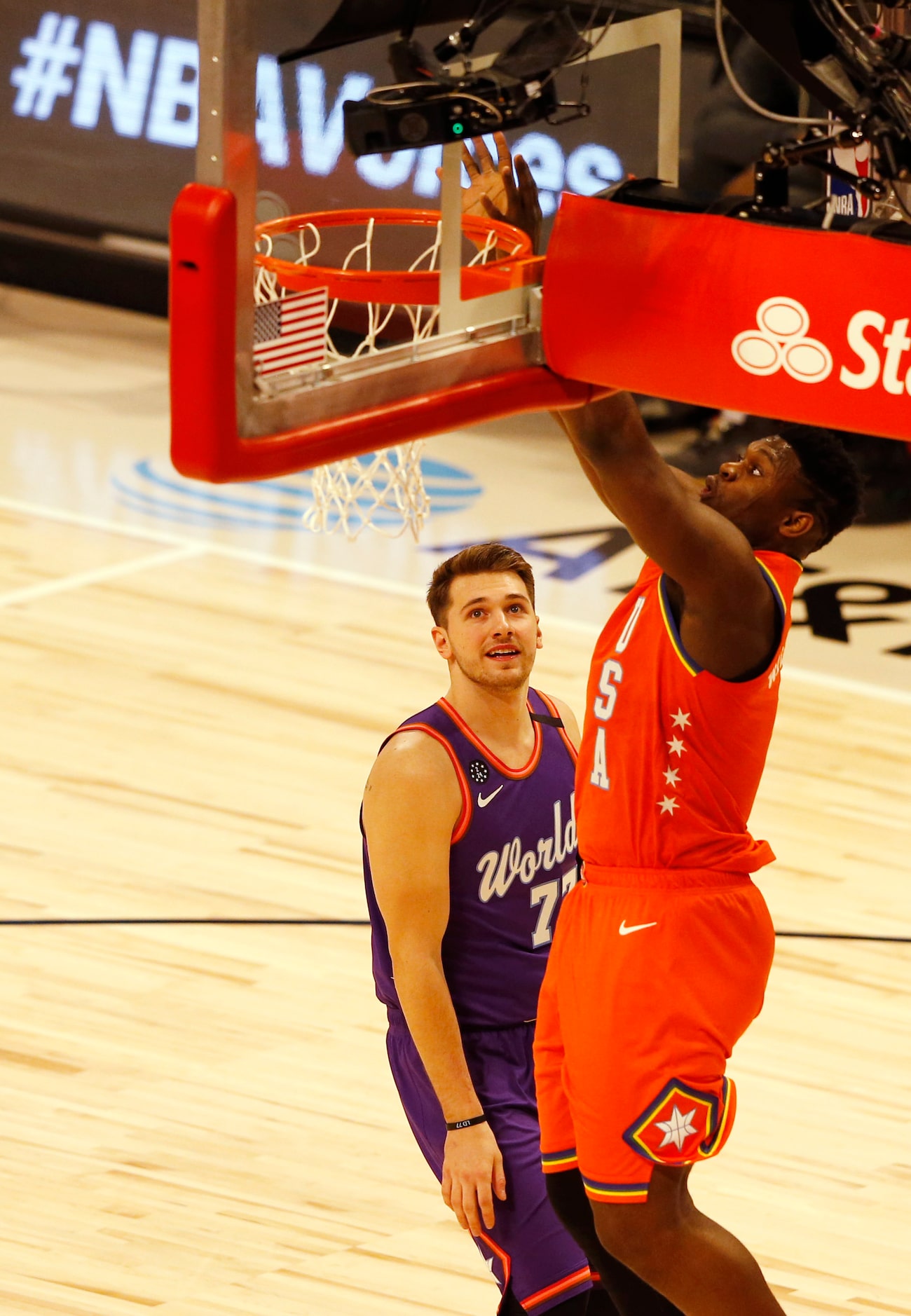 World Team and Dallas Maverickcks Luka Doncic (77) watches as USA Team and New Orleans...