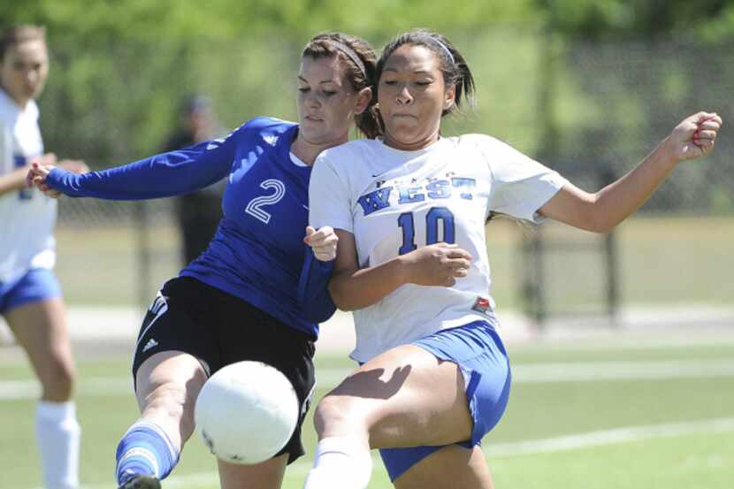 Plano West's Tori Gates (10) and Taylor's Adrienne Perkins (2) during the UIL class 5A girls...