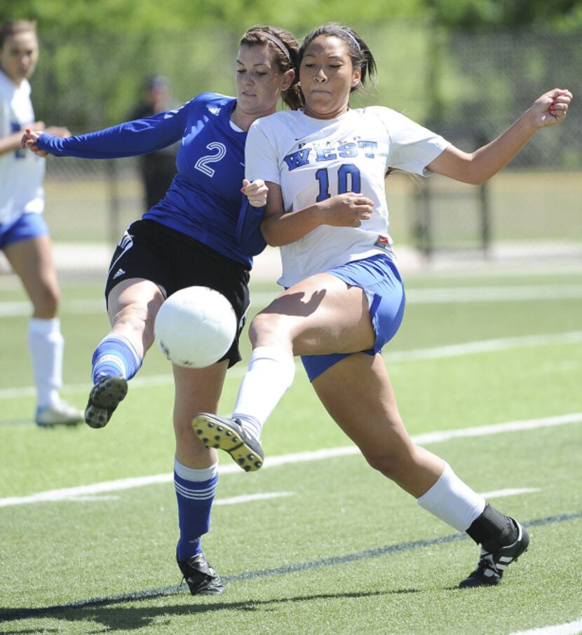 Plano West's Tori Gates (10) and Taylor's Adrienne Perkins (2) during the UIL class 5A girls...