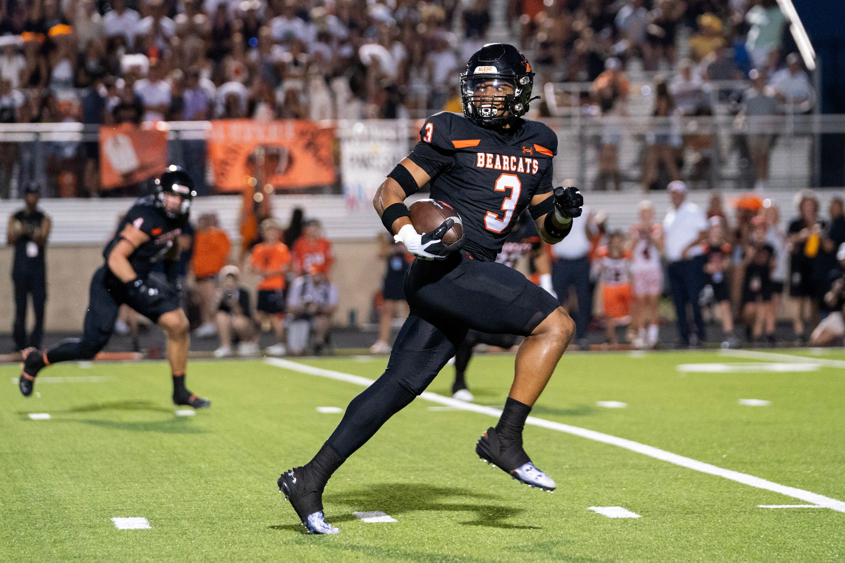 Aledo senior linebacker Davhon Keys (3) returns an interception for a touchdown during the...