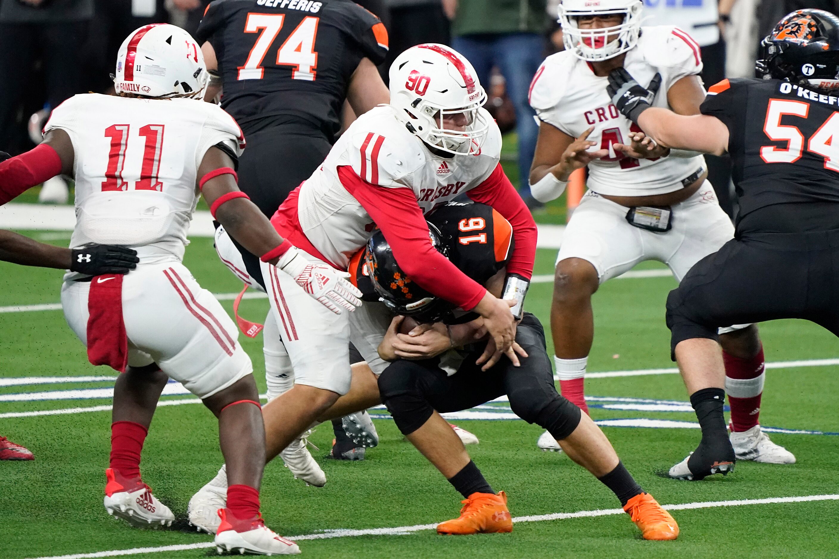 Aledo quarterback Brayden Fowler-Nicolosi (16) is sacked by Crosby defensive lineman Wade...