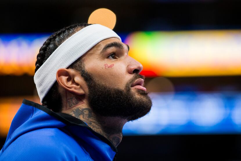 Dallas Mavericks center Willie Cauley-Stein (33) looks up as he warms up before an NBA game...