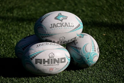 A stack of Dallas Jackals rugby ball are pictured during practice at Choctaw Stadium in...