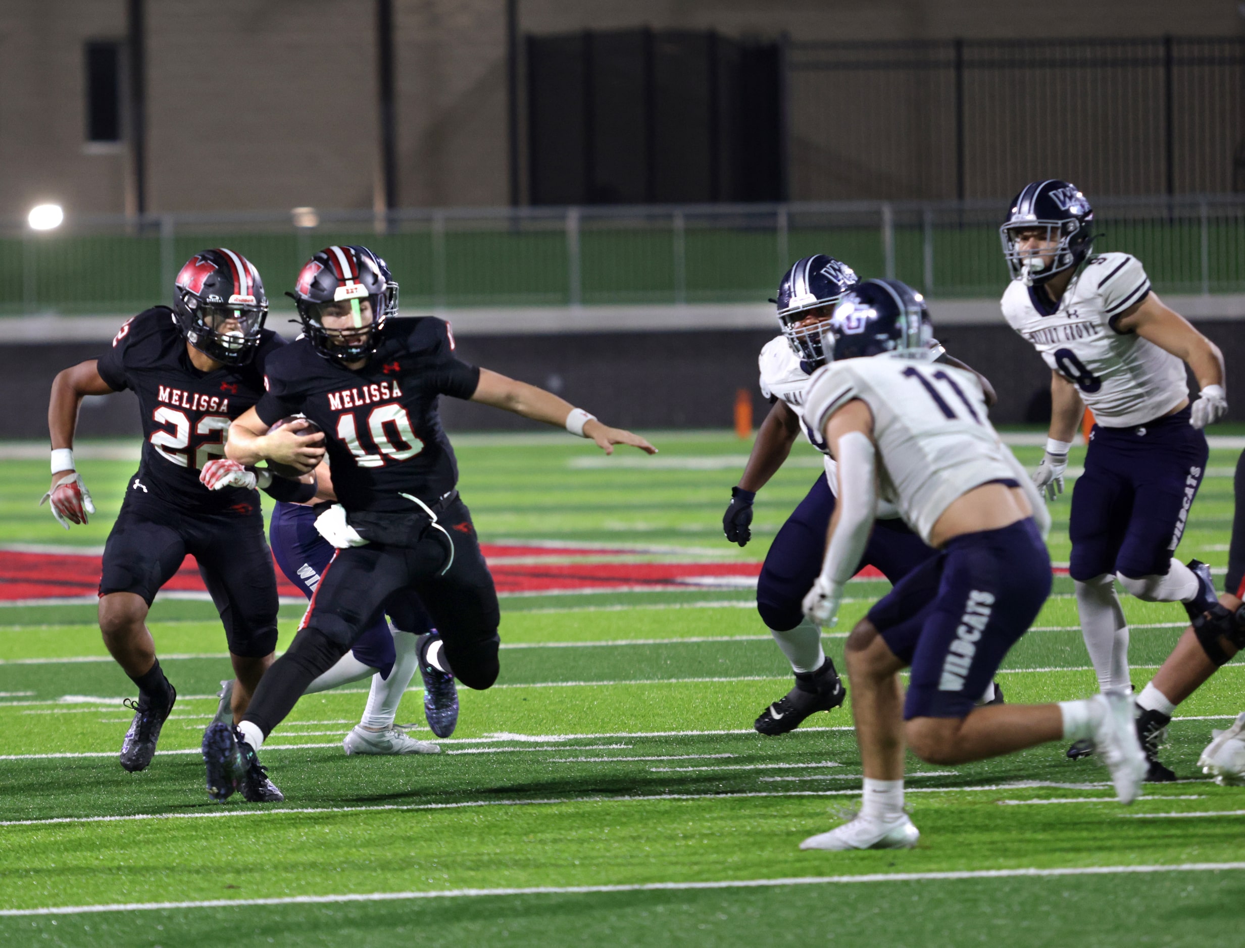 Melissa player #10 Noah Schuback runs the ball during the Prosper Walnut Grove High School...