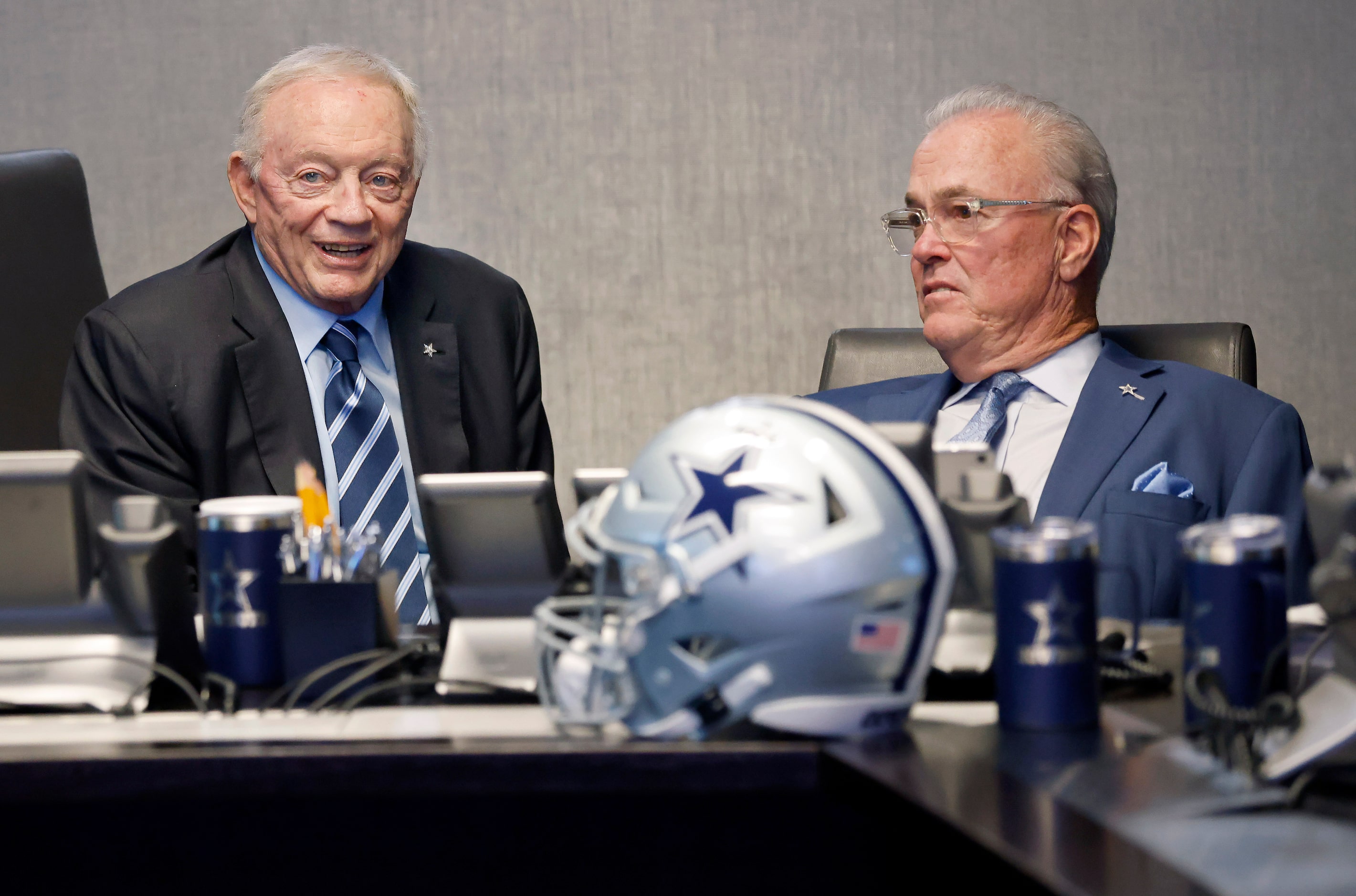 Dallas Cowboys owner Jerry Jones (left) visits with executive vice president & CEO Stephen...