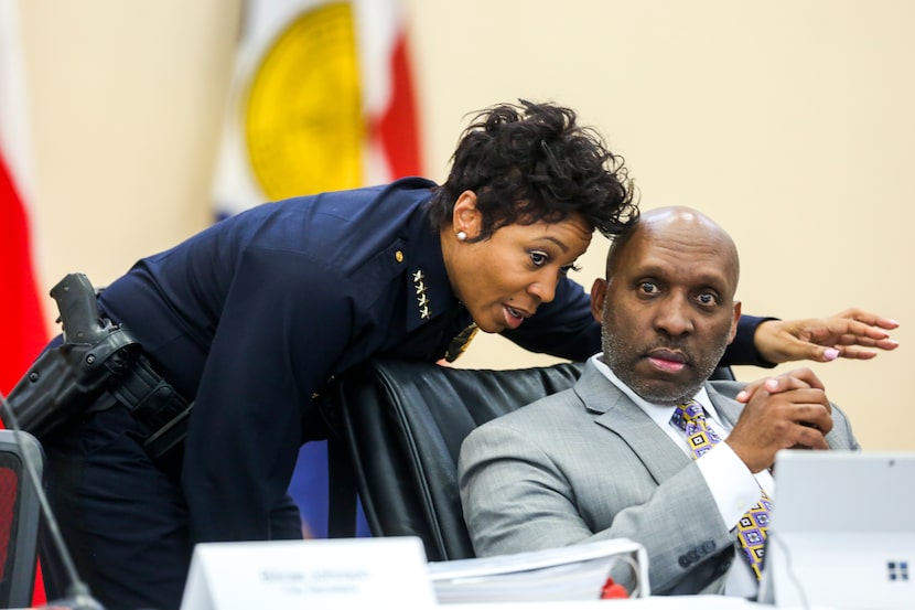 Dallas Police Chief U. Reneé  Hall talks to her boss, Dallas City Manager T.C. Broadnax,...