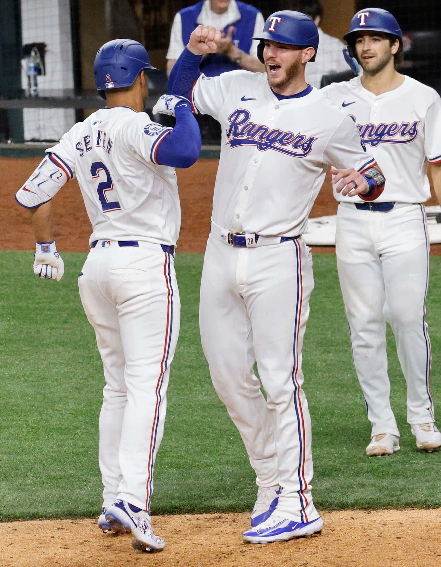Texas Rangers second base Marcus Semien (2) celebrates with his teammates Texas Rangers...