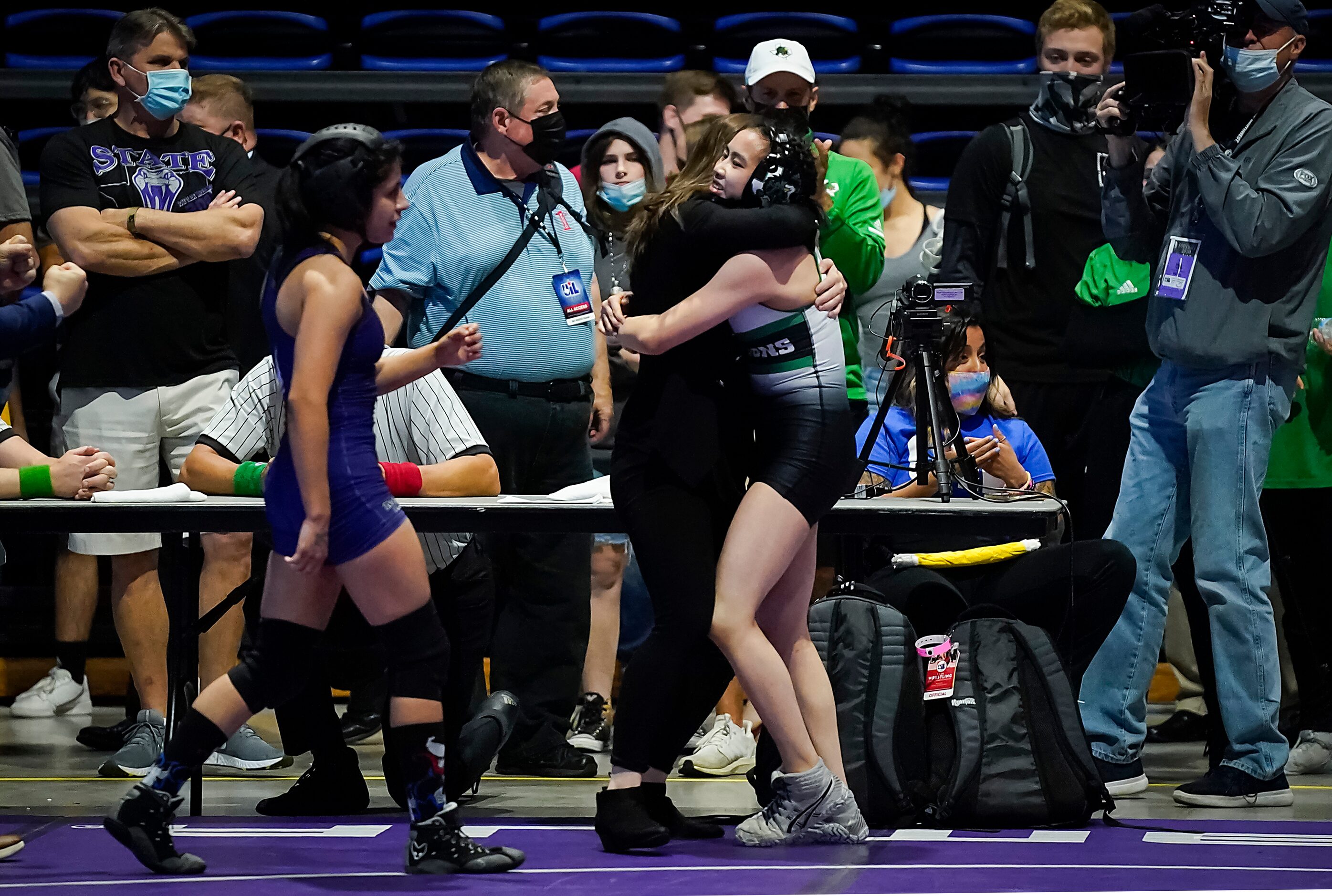 Bayley Trang of Southlake Carroll celebrates after defeating Brittany Cotter of Katy Morton...