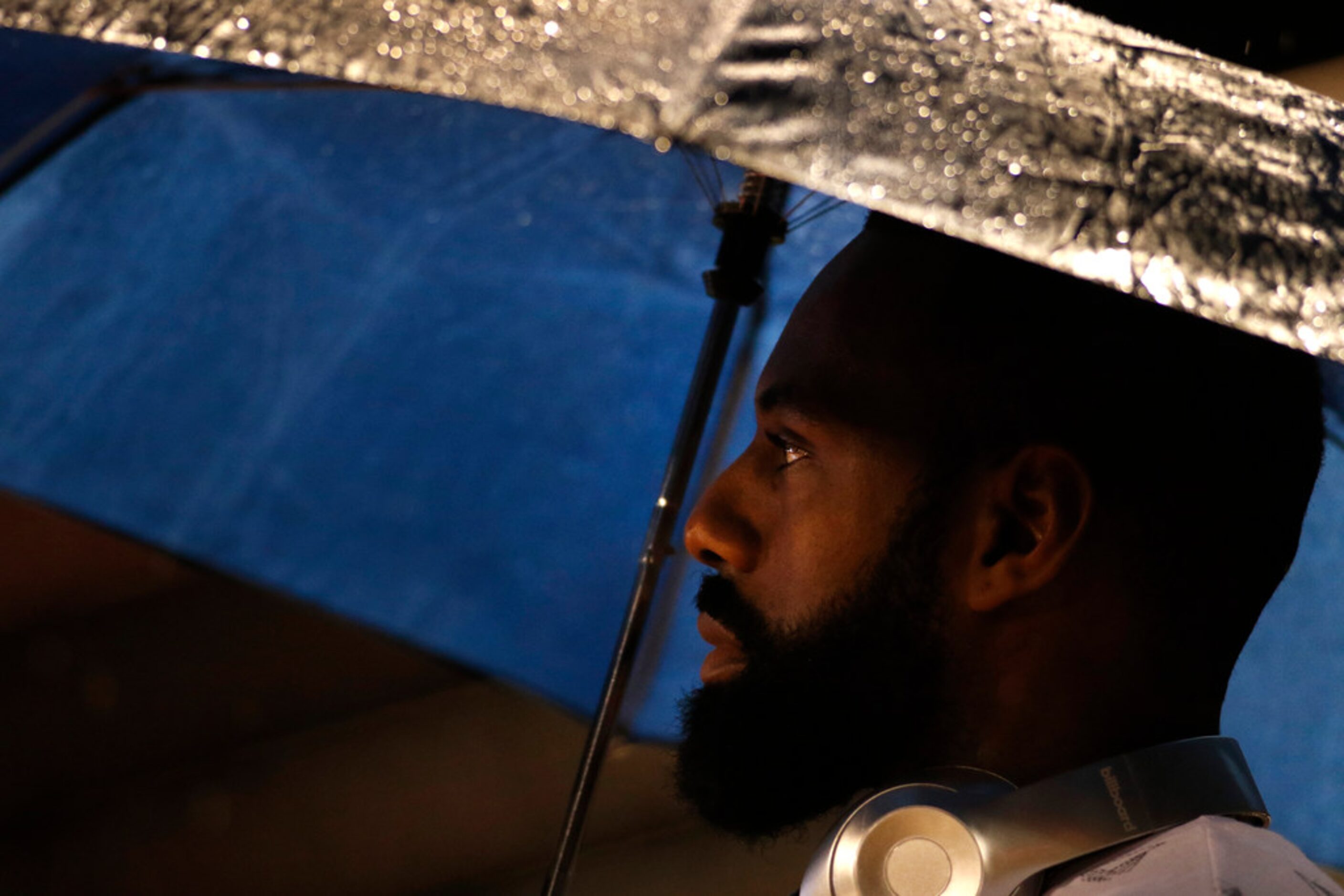 A Duncanville fan pauses for the playing of the school's alma mater prior to the opening...