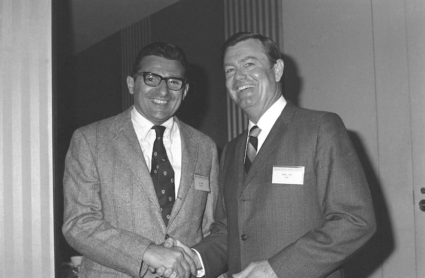 Coaches Joe Paterno, left, of Penn State and Darrell Royal of Texas meet, Jan. 15, 1970 in...