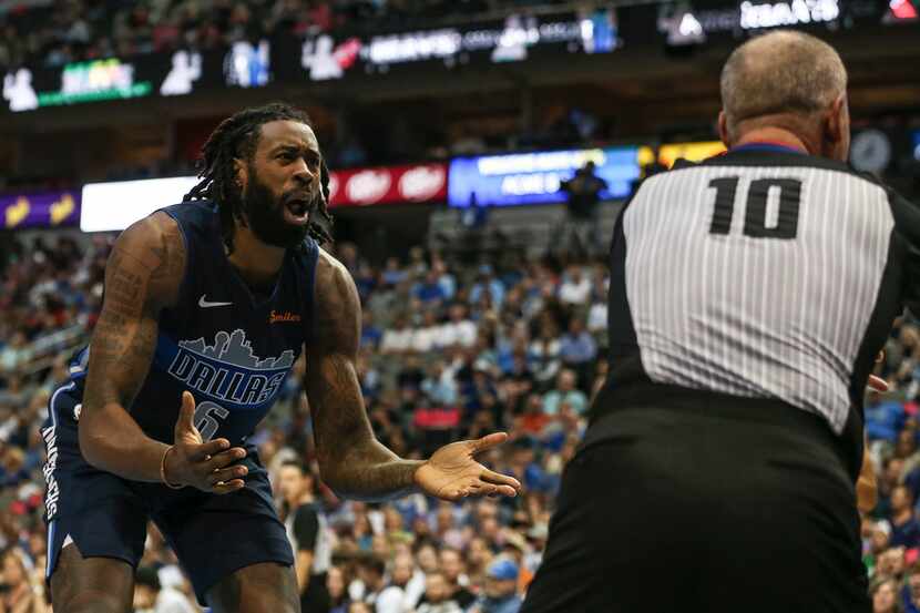 Dallas Mavericks center DeAndre Jordan (6) reacts to a call by referee Ron Garretson (10)...