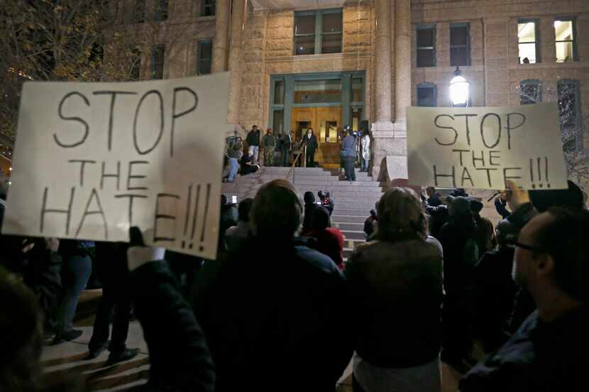 People gather to protest against police brutality at Tarrant County Courthouse in downtown...