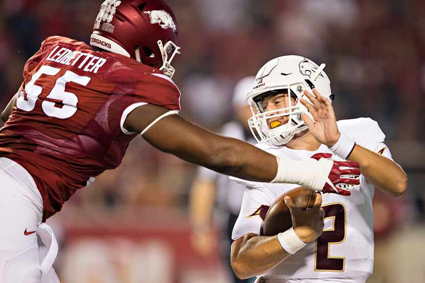 FAYETTEVILLE, AR - SEPTEMBER 17:  Jeremiah Ledbetter #55 of the Arkansas Razorbacks sacks...