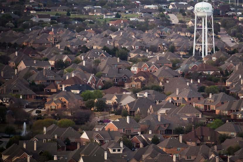 Rows of suburban homes seen in an aerial view in Prosper, Texas. (Smiley N. Pool/The Dallas...