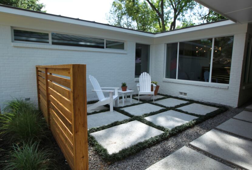 Modern Craft added a semi-private courtyard at the front entrance. The couple chose the...