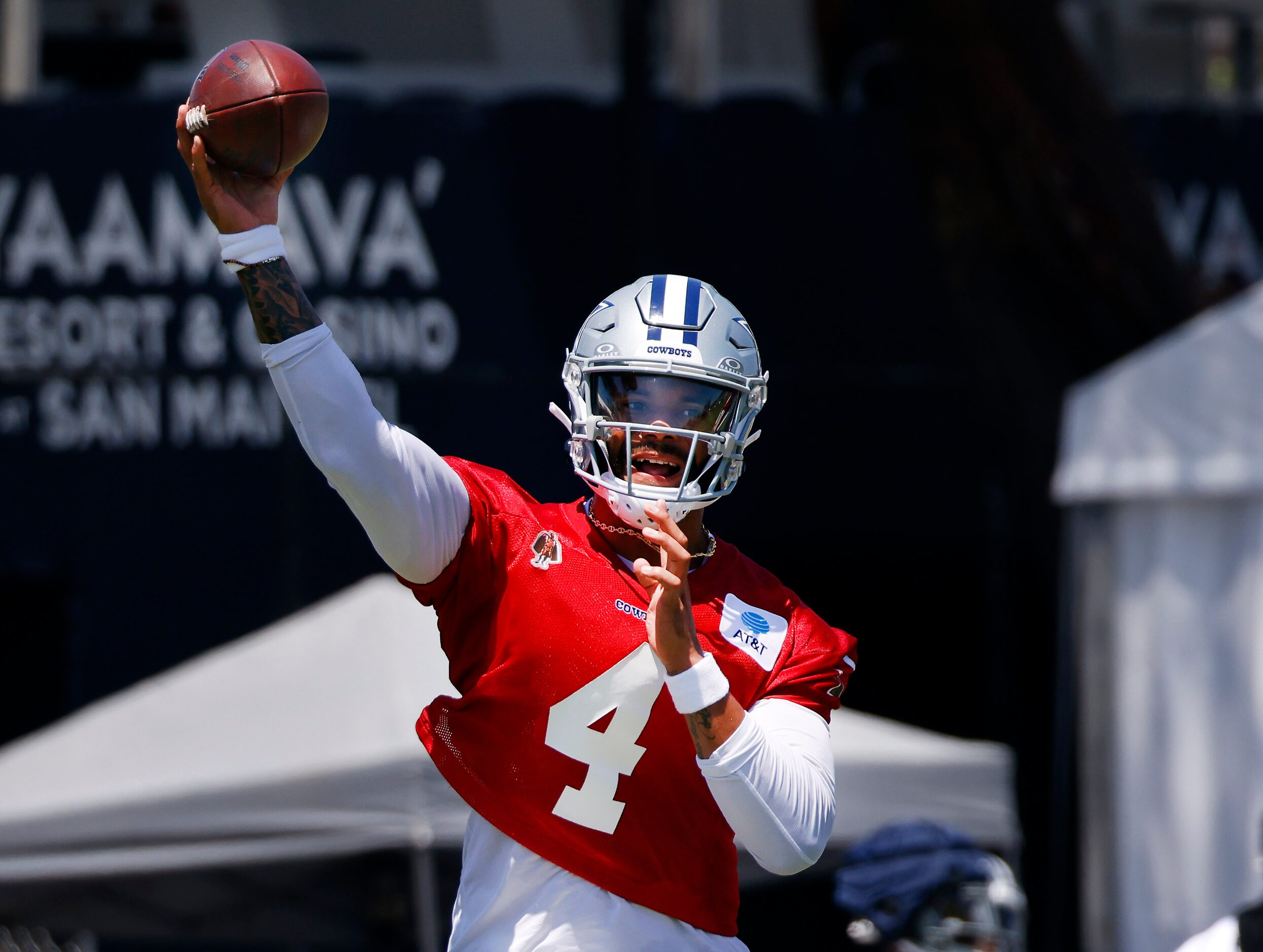 Dallas Cowboys quarterback Dak Prescott (4) fires pass during a training camp practice in...