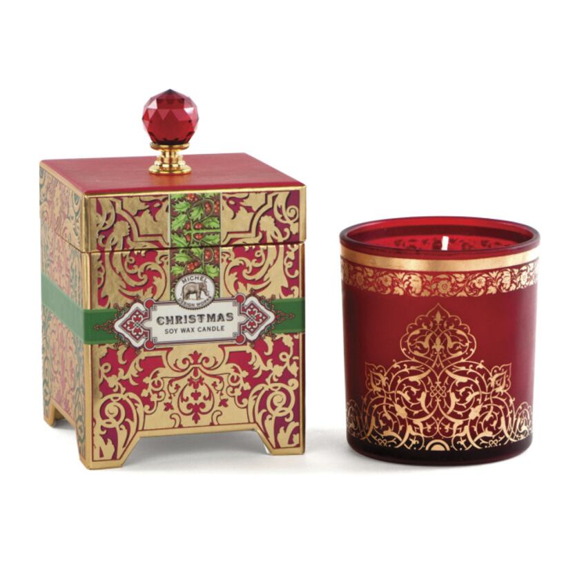 A 14 oz Christmas spice candle is festive in a gold printed, reusable glass container and...