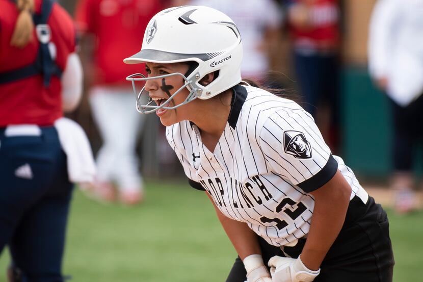 Bishop Lynch senior Evelyn Santos (12) exclaims after scoring a run during the TAPPS...