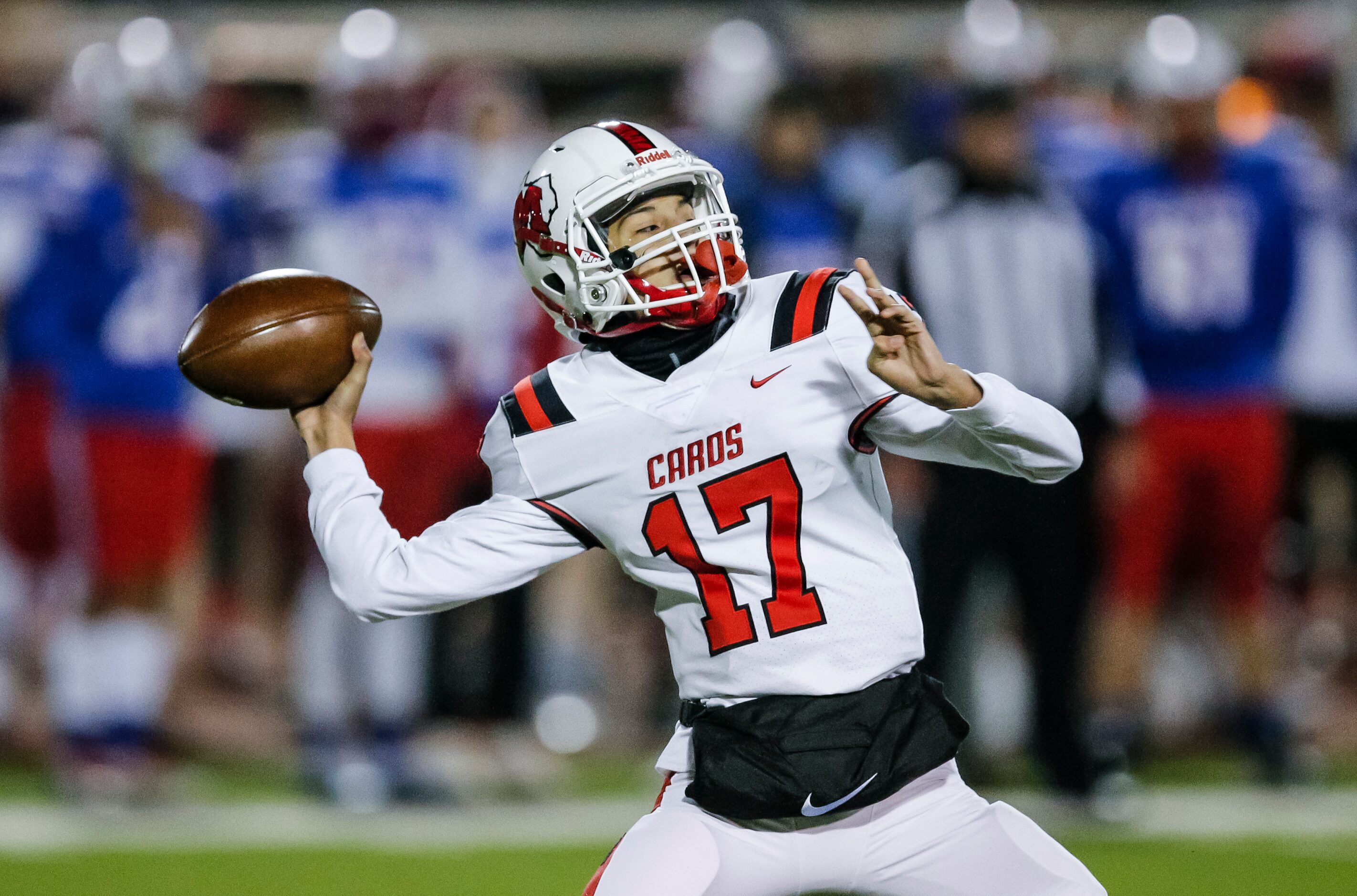 Irving MacArthur sophomore quarterback Glendon Casas-Willis (17) throws during the first...