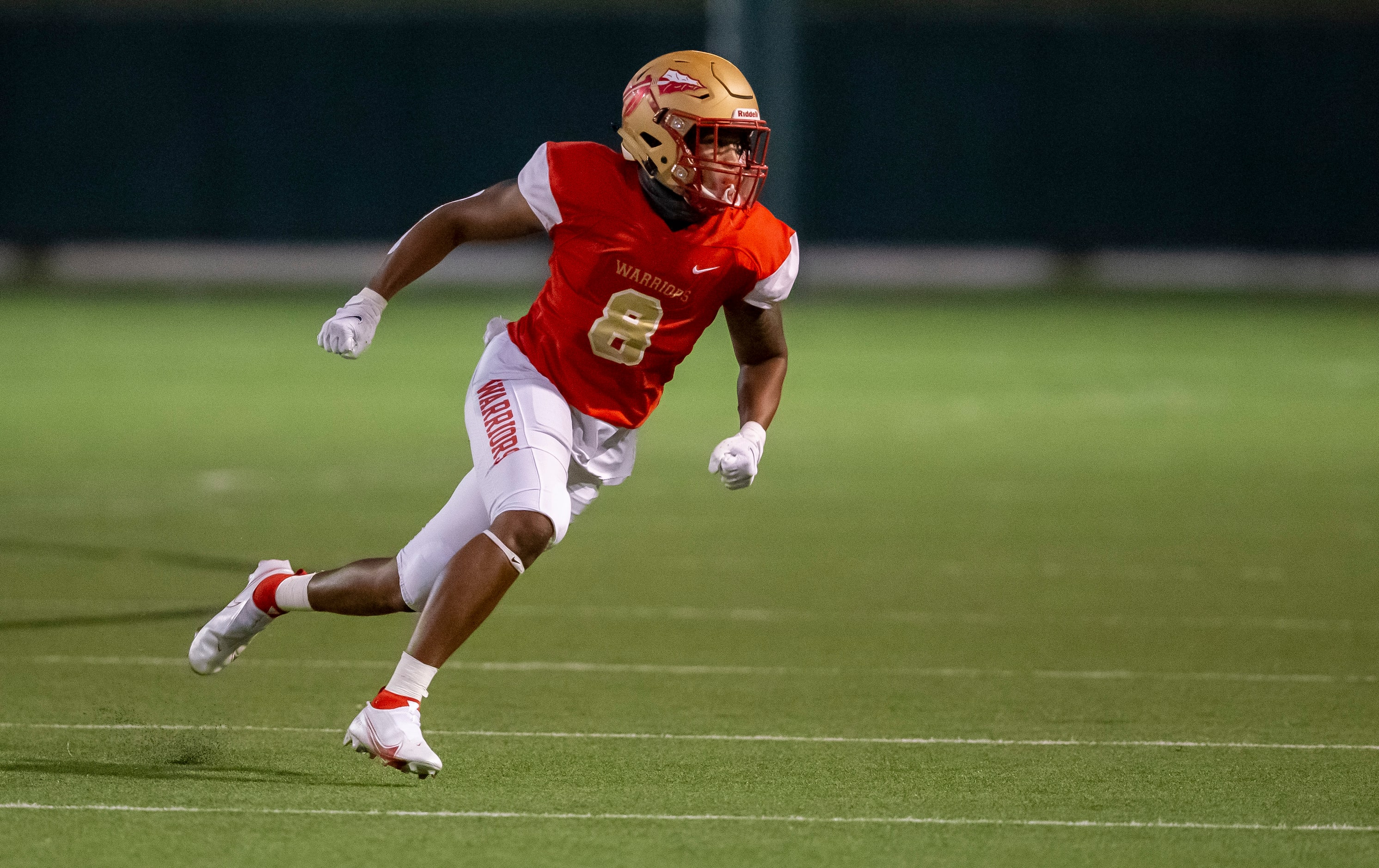 South Grand Prairie senior wide receiver Deamikkio Nathan (8) runs a play during the first...