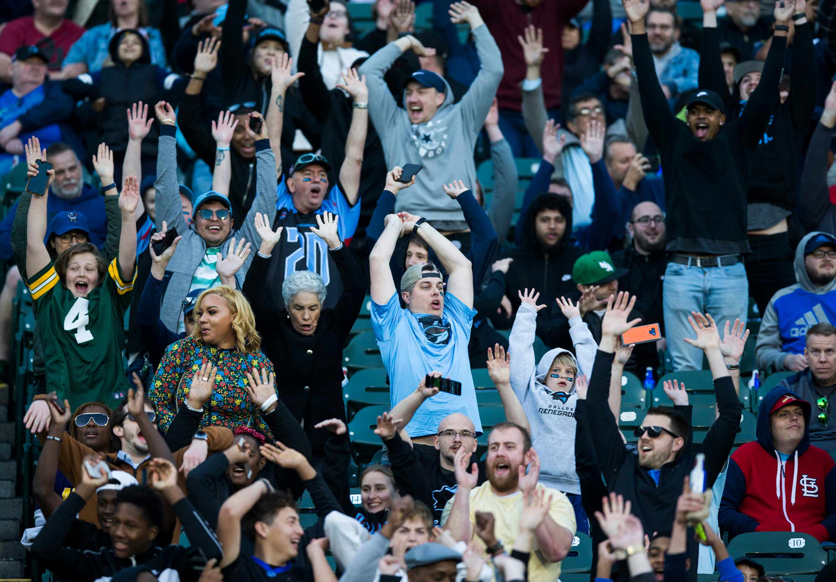 Fans do the wave during the third quarter as the Dallas Renegades play host to the New York...