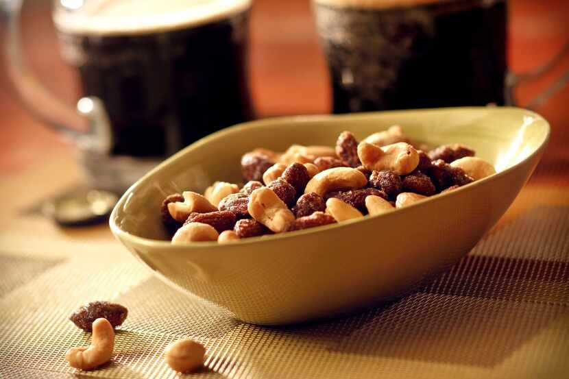 The sweet-and-salty snack of beer nuts as made at Deschutes Brewery  in Portland, Oregon,...