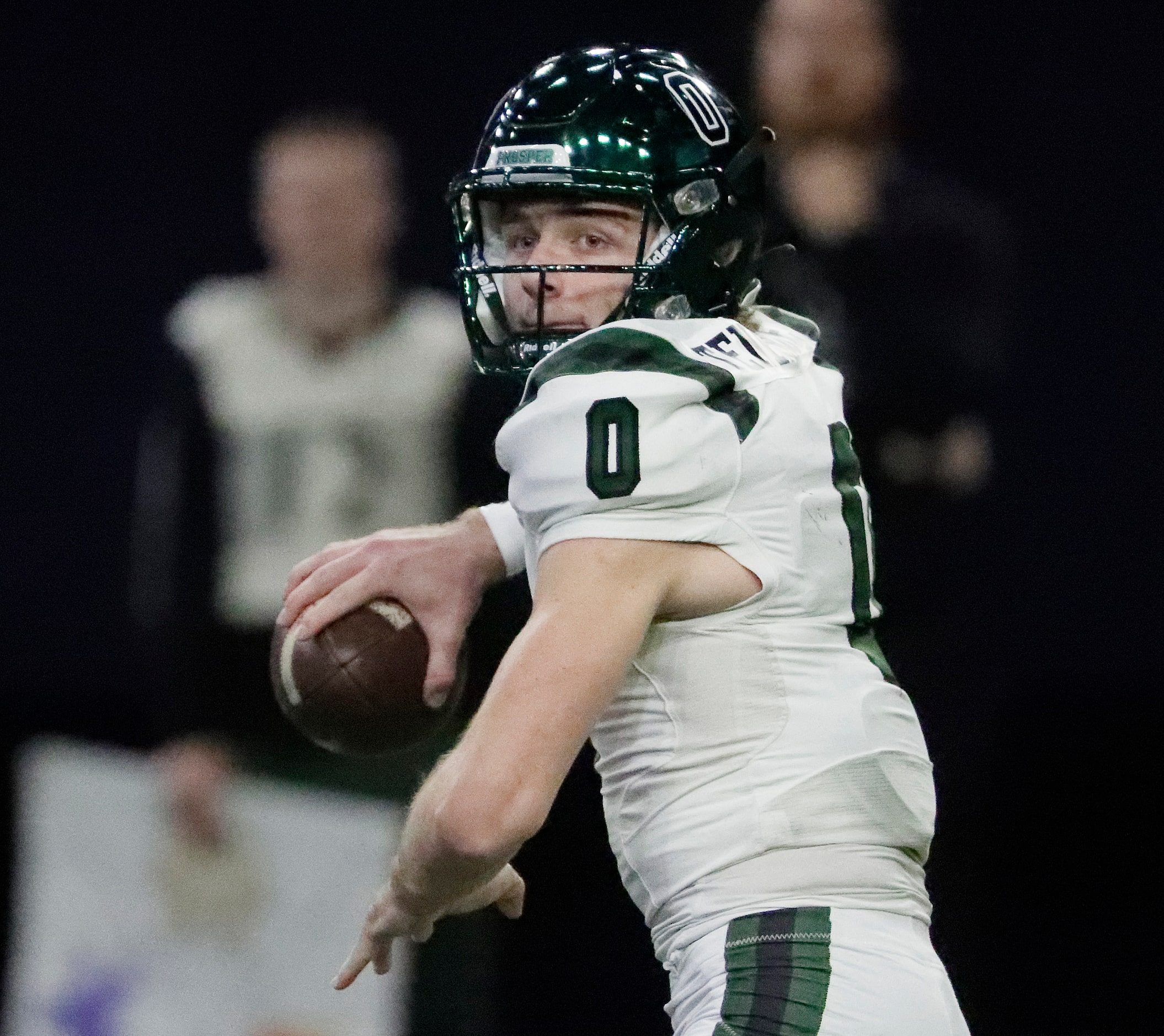 Prosper High School quarterback Nathan TenBarge (0) throws a pass during the first half as...