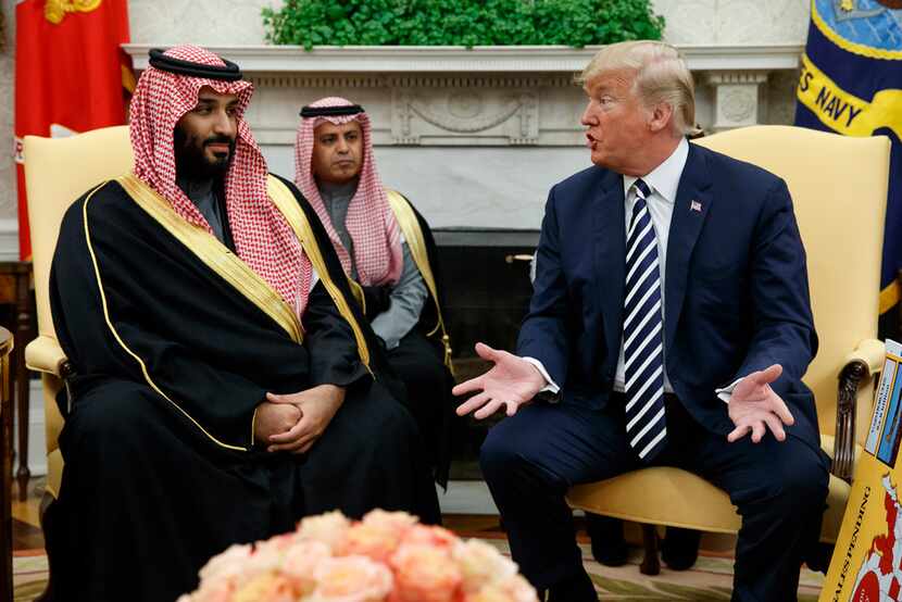 In this March 20, 2018, file photo, President Donald Trump meets with Saudi Crown Prince...