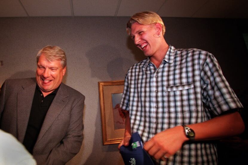  [NS_28DirkAirport2]  Caption: 6-28-98----Dirk Nowitzki, right, takes in a laugh with ...