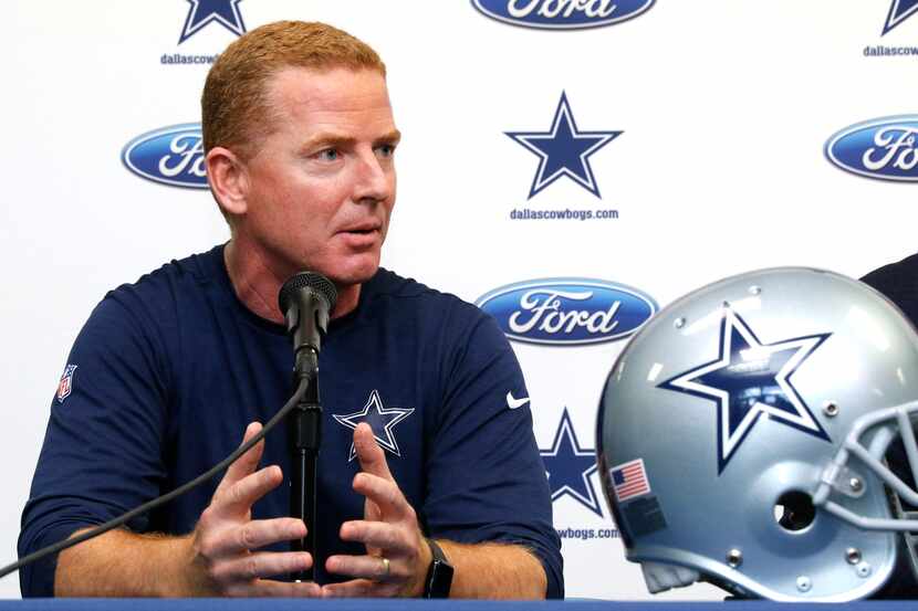 Dallas Cowboys head coach Jason Garrett answers questions from the media during a pre-draft...