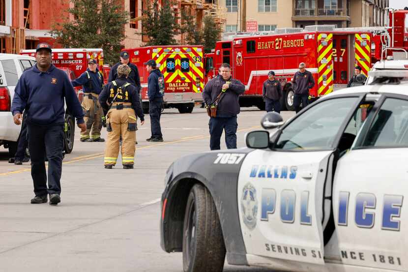 Dallas police and Dallas Fire-Rescue work a scene where a person was reported to be in...