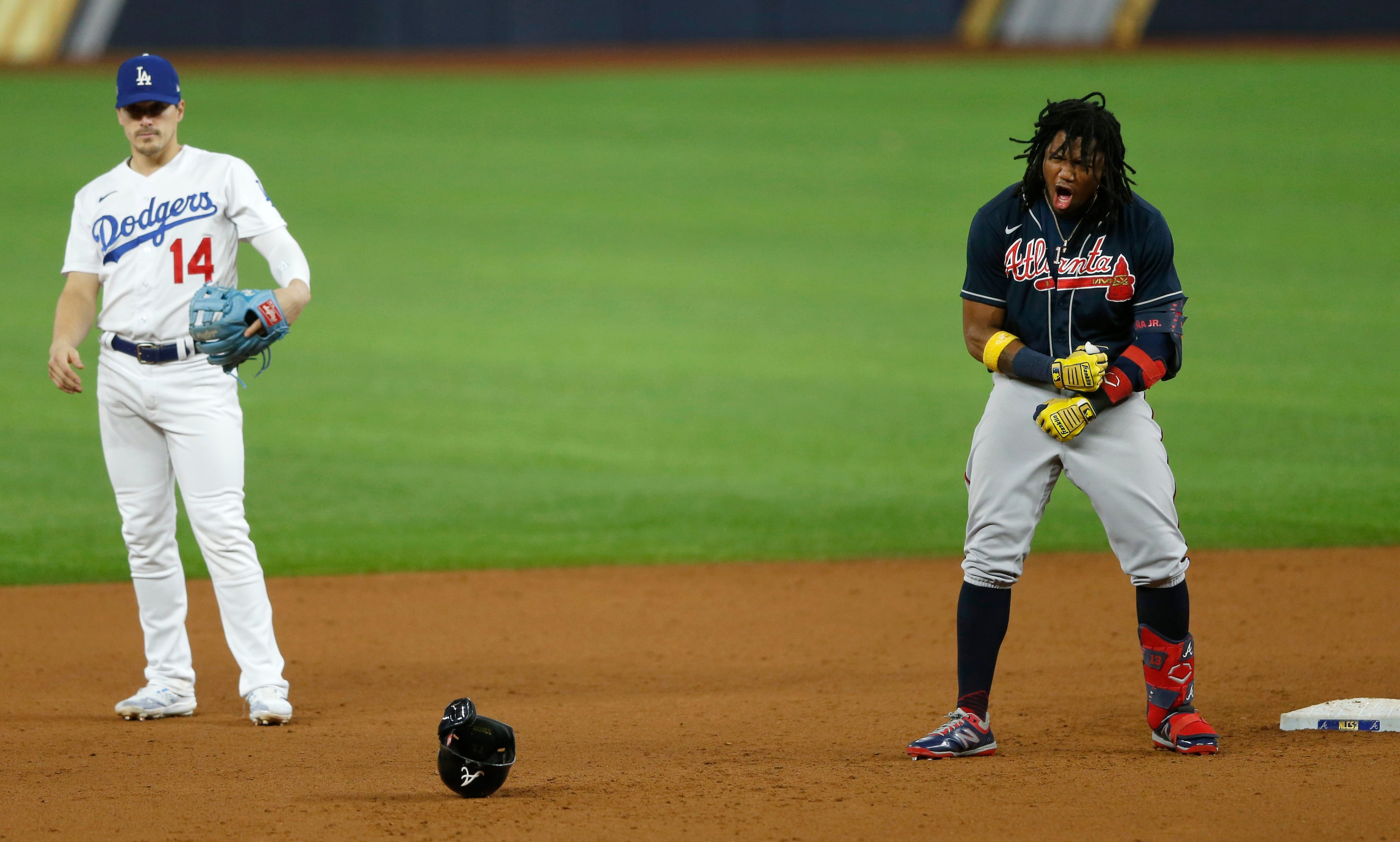 Atlanta Braves center fielder Ronald Acuna Jr. (13) celebrates after hitting a double in...