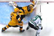 Pittsburgh Penguins goaltender Casey DeSmith (1) blocks a shot by Dallas Stars' Mattias...