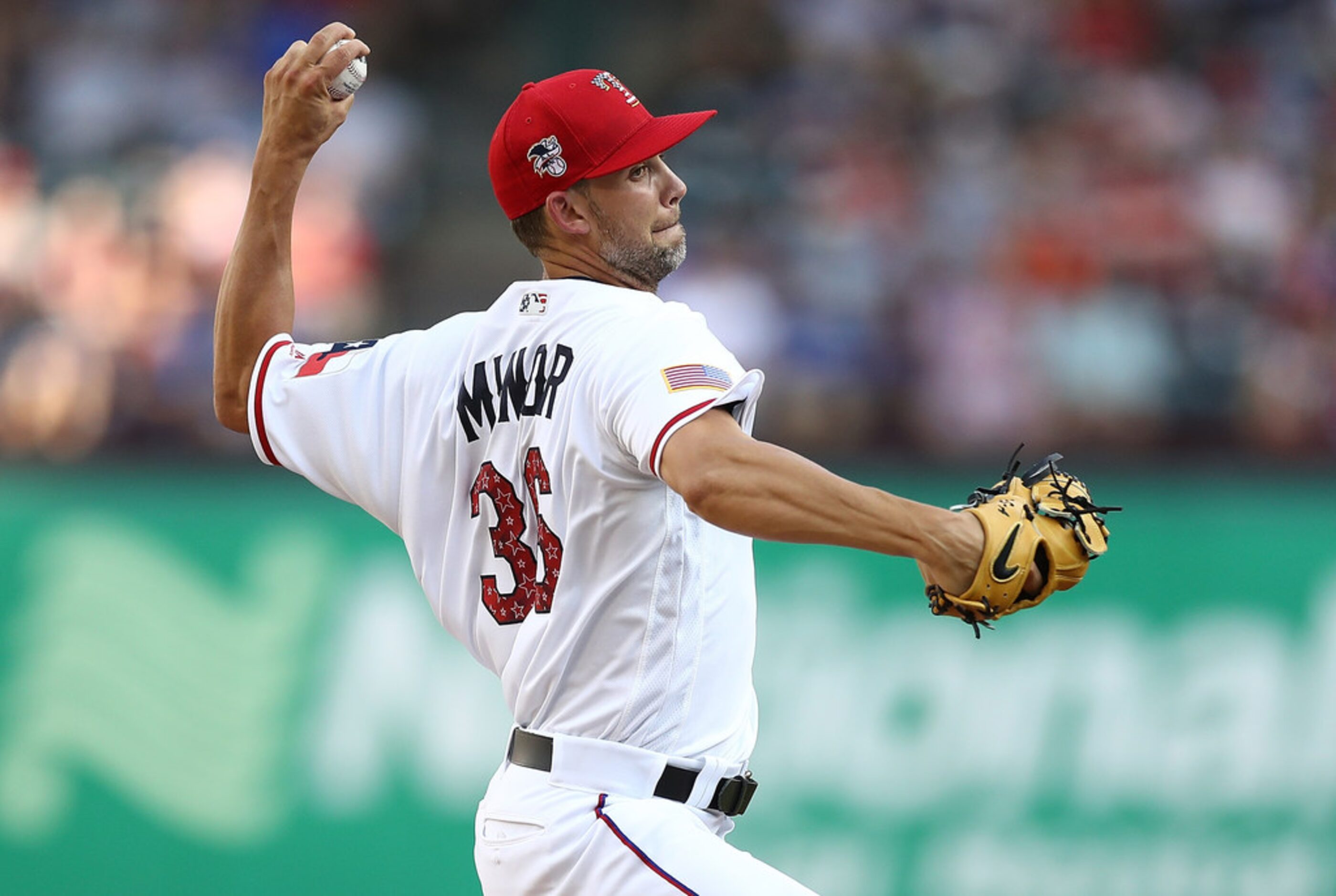 ARLINGTON, TX - JULY 04:  Mike Minor #36 of the Texas Rangers throws against the Houston...