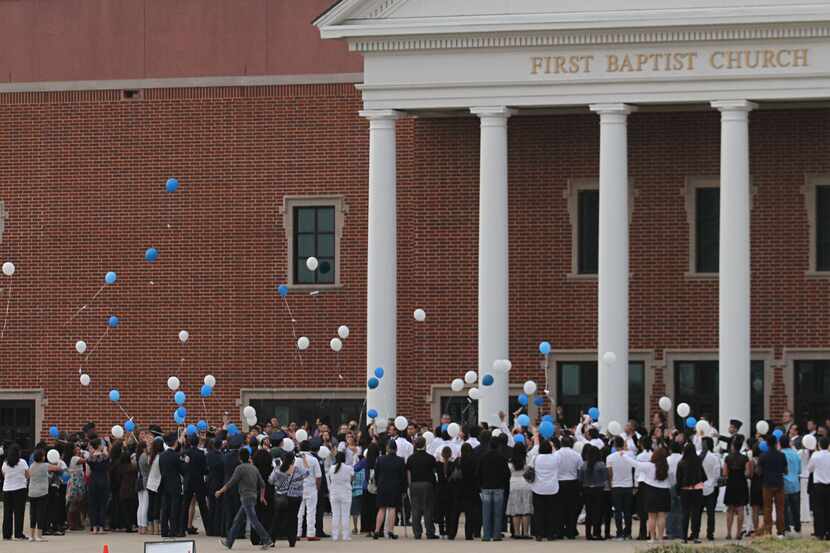 Mourners released balloons after the funeral of 17-year-old Ivan Mejia on March 14 at the...